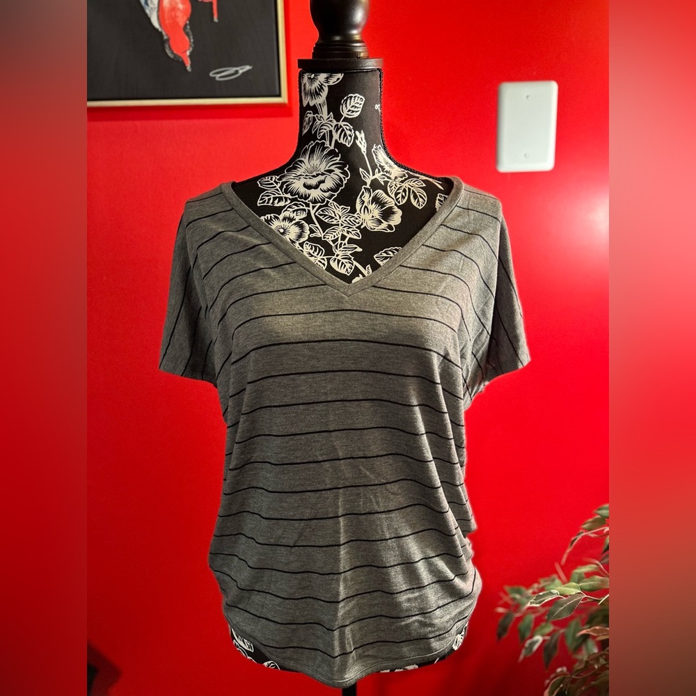 EXPRESS. V-neck, scoop (longer) back Size S.